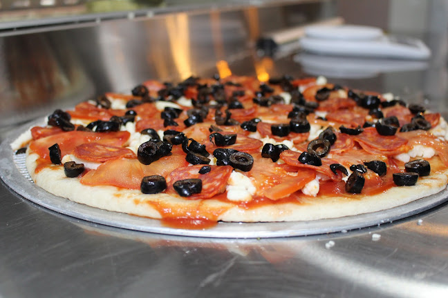 Delizzia Pizzeria - Gastronomía y hostelería