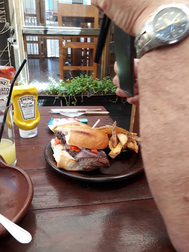 Origen Restoran Phone number