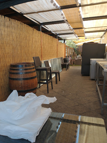 LAS BRASAS QUILICURA Phone number