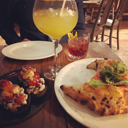 Omerta pizza & bar Phone number