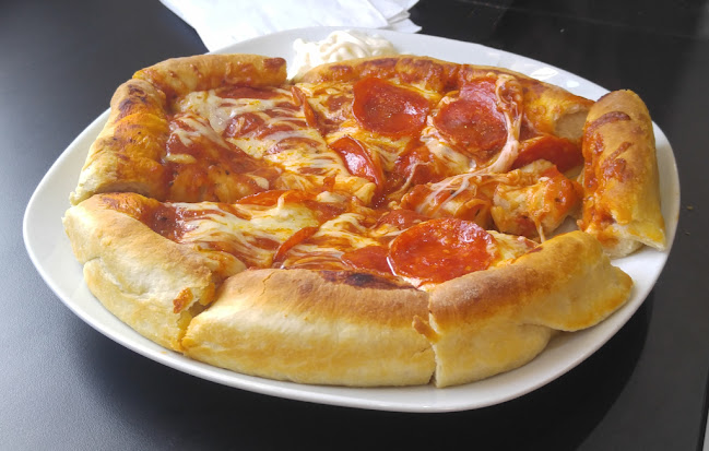 Geno's Pizzeria - Gastronomía y hostelería