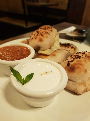 Storia Pizza e Cafe - Gastronomía y hostelería