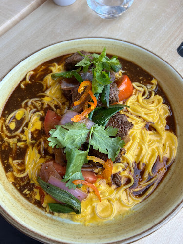 Comments and reviews of LaNacional Mall Plaza Los Dominicos