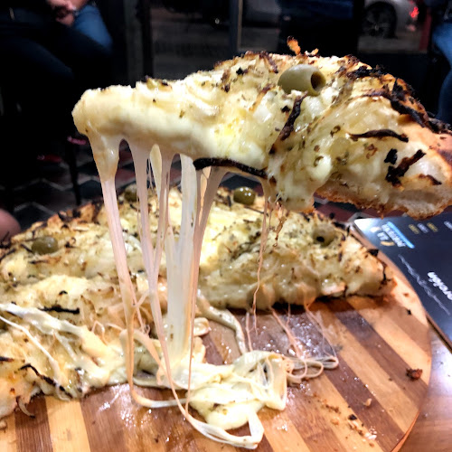 Pizzería La Porteña - Gastronomía y hostelería