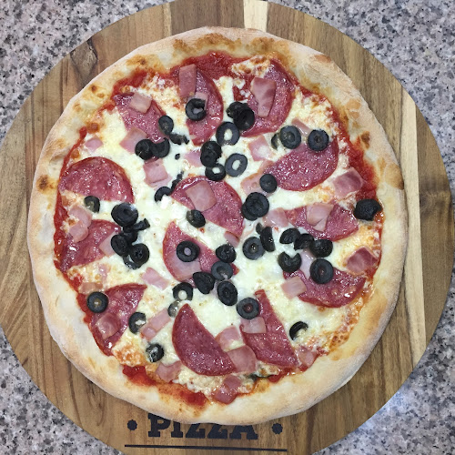 PitStop Pizza & Pollo - Gastronomía y hostelería