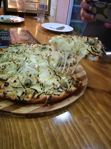 Pizzería La Porteña Phone number